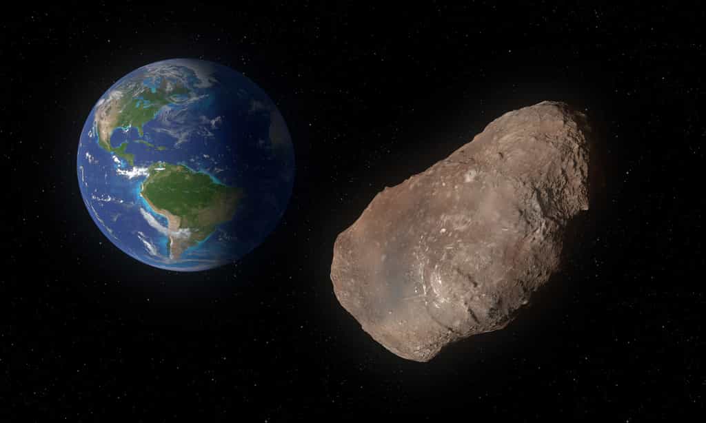 Un astéroïde d’environ 1 km va passer près de la Terre le 4 février. Ici, illustration de l'astéroïde 2002 AJ129 frôlant la Terre. © ordus, Fotolia