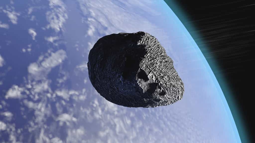 Illustration d’un astéroïde passant à proximité de la Terre. © auntspray, fotolia