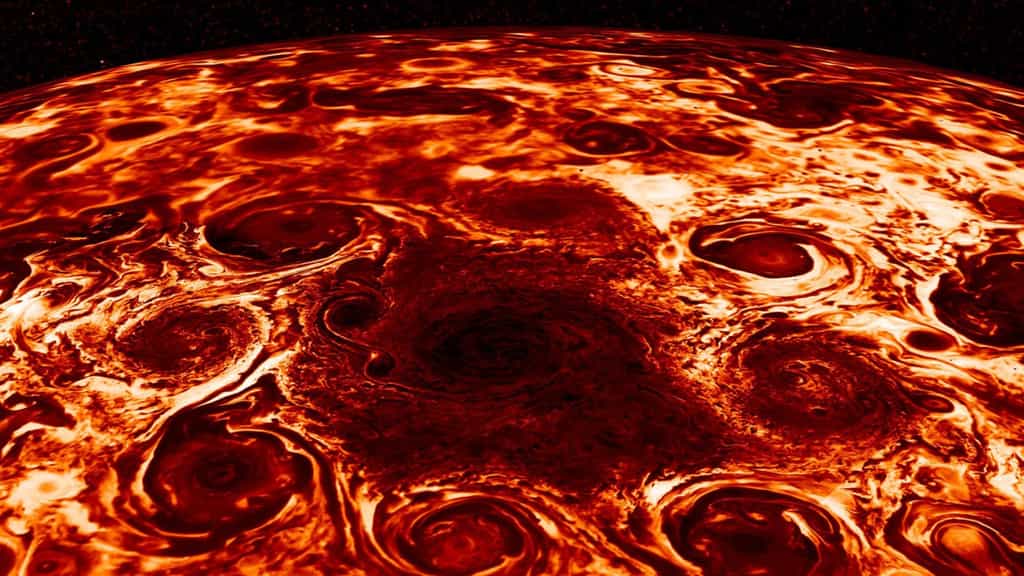 Cette image générée par ordinateur est basée sur une image infrarouge de la région polaire nord de Jupiter qui a été acquise le 2 février 2017 par l'instrument JIRAM à bord de Juno pendant son quatrième passage. © NASA/JPL-Caltech/SwRI/ASI/INAF/JIRAM