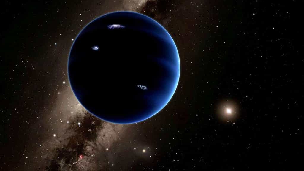 Une vue d'artiste de la neuvième planète qui existe peut-être à plus de 200 fois la distance de la Terre au Soleil, loin au-delà de l'orbite de Pluton. Sa masse est estimée à environ 10 fois celle de la Terre. Elle devrait, logiquement, être enveloppée par une épaisse atmosphère d'hydrogène et d'hélium qui la ferait ressembler à Neptune. © Caltech, R. Hurt (Ipac)