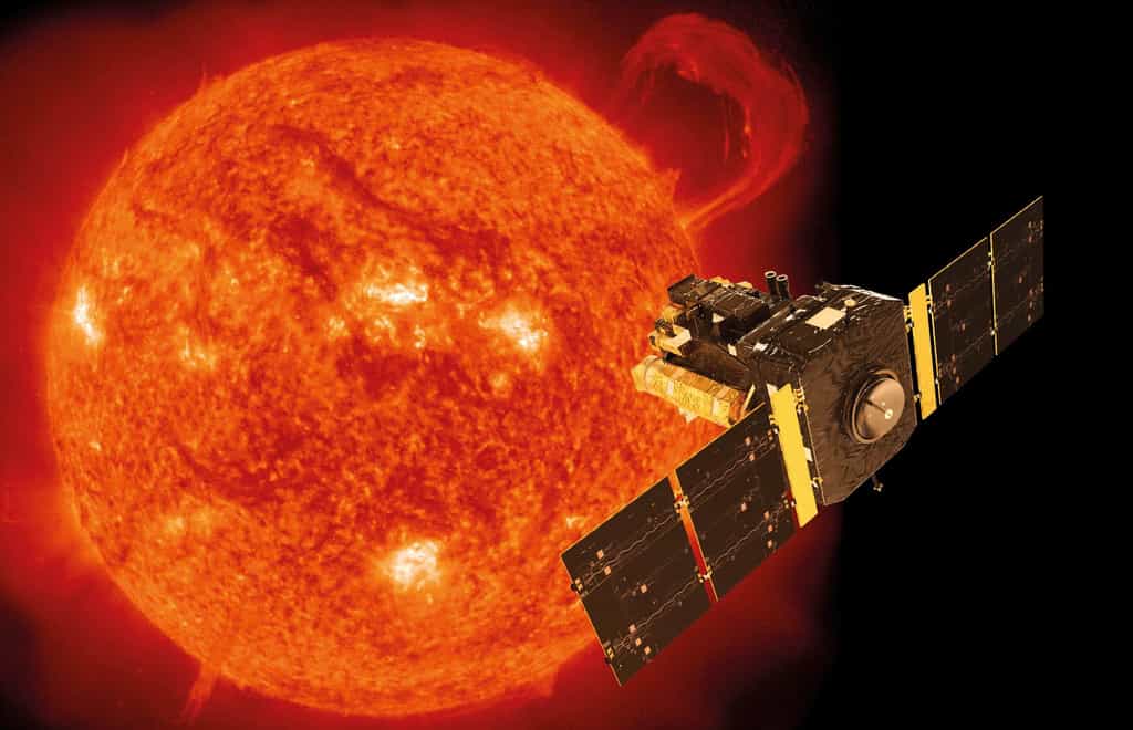 Le cœur du Soleil tourne 4 fois plus vite que sa surface. Ici, une illustration de Soho superposée à une image de notre étoile prise par le satellite le 14 septembre 1999 avec l’instrument EIT (Extreme-ultraviolet Imaging Telescope). Ce jour-là, une gigantesque protubérance en forme de poignet se développait sur le limbe du Soleil. Le pic d’activité du cycle 23 allait alors débuter. © Soho, ESA, Nasa, ATG medialab
