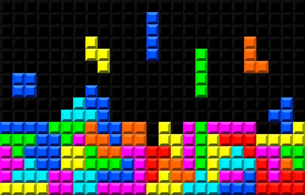 Pour remporter des tournois de Tetris sur la Nintendo NES, des joueurs font rouler leurs doigts sur l’arrière de la manette. © Alex, Adobe Stock