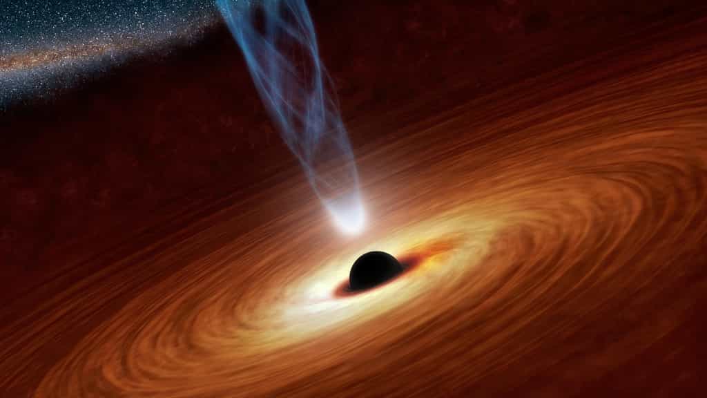 Cette vue d'artiste illustre un trou noir supermassif avec des millions à des milliards de fois la masse de notre Soleil. Les trous noirs supermassifs sont des objets extrêmement denses enfouis au cœur des galaxies. Dans cette illustration, le trou noir supermassif au centre est entouré de matière s'écoulant vers le trou noir et formant ce que l'on appelle un disque d'accrétion. On voit également un jet de particules énergétiques, censé être alimenté par la rotation du trou noir. © NASA/JPL-Caltech
