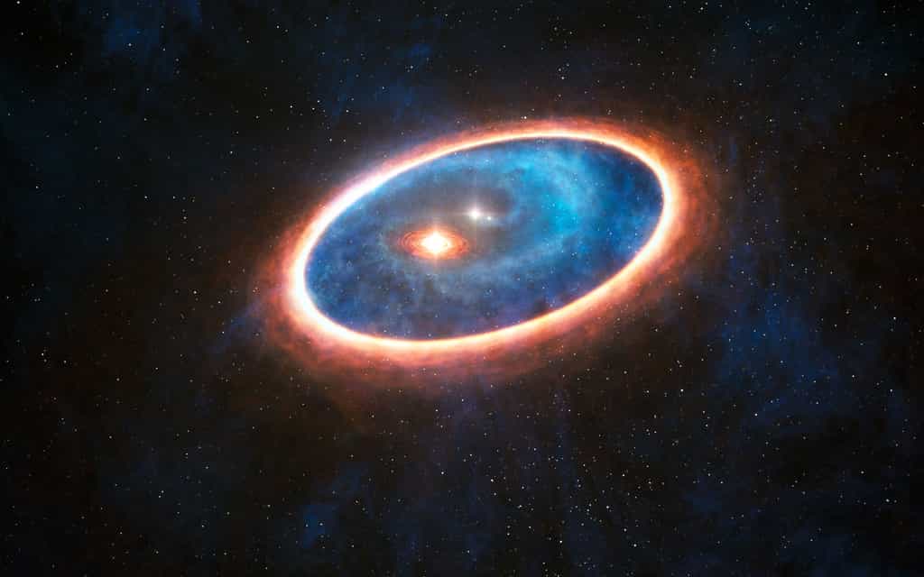 Cette vue d’artiste montre le gaz et la poussière qui entourent le système d’étoiles doubles GG Tauri-A. Des chercheurs ont détecté, au moyen d’Alma, la présence de gaz dans la région séparant les deux disques de ce système binaire. Cette structure est susceptible de favoriser la formation de planètes au sein de l’environnement gravitationnellement perturbé du système binaire. © Eso, L. Calçada
