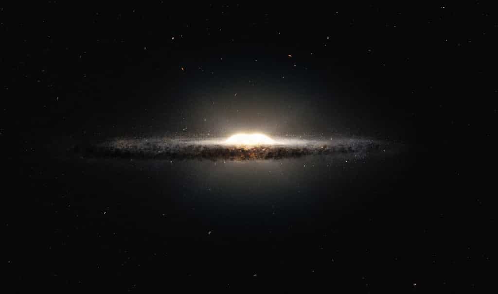 Cette vue d'artiste montre à quoi la Voie lactée ressemblerait si nous l'observions depuis le dessus et sous un angle différent de&nbsp;celui que nous avons depuis&nbsp;la Terre. Le bulbe central apparaît sous la forme d'une cacahuète constituée d'étoiles rougeoyantes, et les bras spiraux ainsi que les nuages de poussières associés constitueraient une bande étroite. © M. Kornmesser et R. Hurt, Eso, Nasa, JPL-Caltech