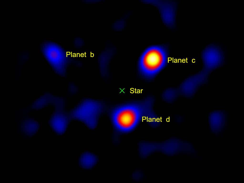 Trois planètes ont été observées autour de l'étoile HR-8799, en obscurcissant l'astre grâce à un procédé, la coronographie. © Nasa, JPL-Caltech, Observatoire Palomar