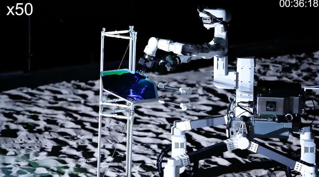 La vidéo de démonstration publiée par l'entreprise Gitai montre le rover placer avec précision des panneaux solaires sur une structure prévue à cet effet. © Gitai, Jaxa