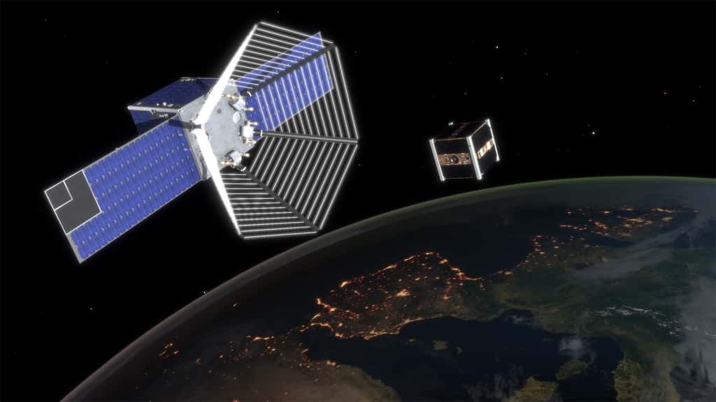 Étude conceptuelle, réalisée par ClearSpace, d’un satellite chasseur de débris, ici sur ce dessin, s'apprêtant à capturer un satellite en fin de vie. © EPFL, J.Caillet