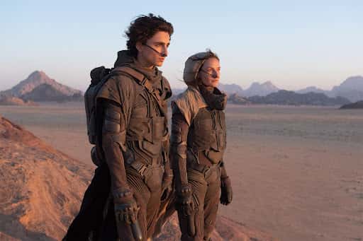 Extrait du film Dune (2021), avec Timothée Chalamet et Rebecca Ferguson. © Warner Bros., Legendary Pictures