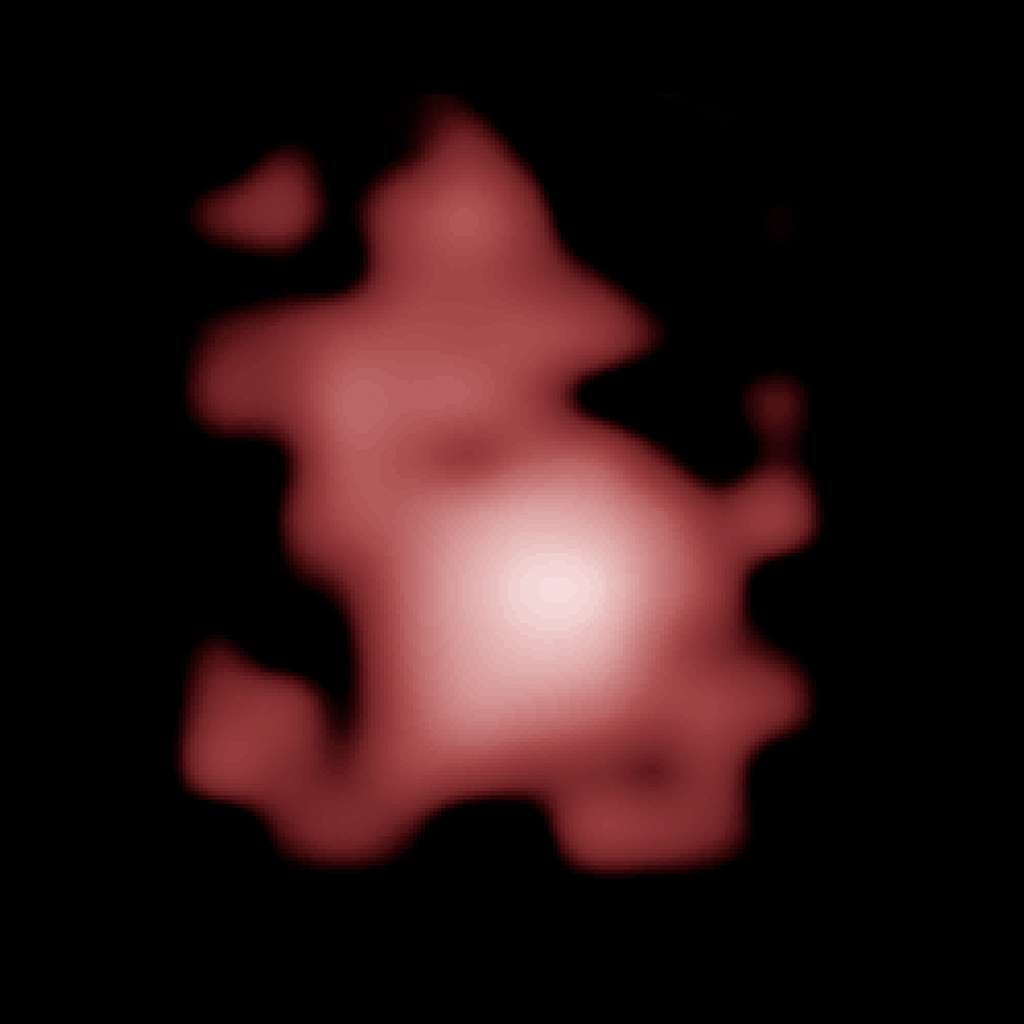 GN-z11 est une jeune galaxie plus brillante que prévu, comme l'ont montré Spitzer et Hubble. Bien que plus petite que la Voie lactée, elle donne naissance à 20 fois plus d’étoiles. © Nasa, Esa, P. Oesch (<em>Yale University</em>), G. Brammer (STScI), P. van Dokkum (<em>Yale University</em>), G. Illingworth (<em>University of California</em>, Santa Cruz)