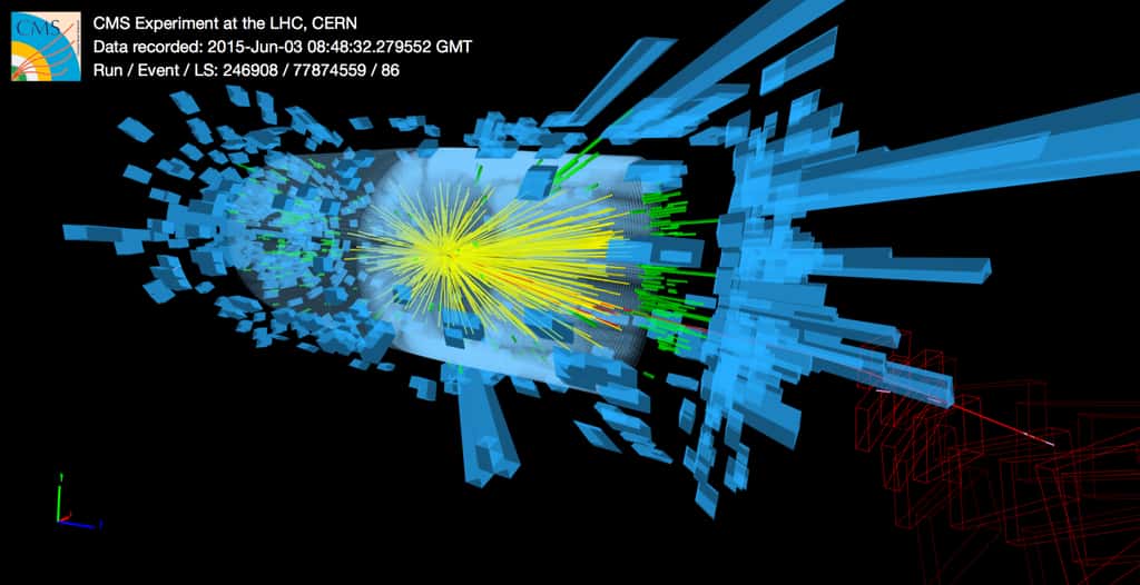 Première image de collision dans l'expérience CMS. Les cylindres bleus montrent l'énergie des particules dans les calorimètres du détecteur et les lignes jaunes les traces des particules dans le trajectographe. © Cern
