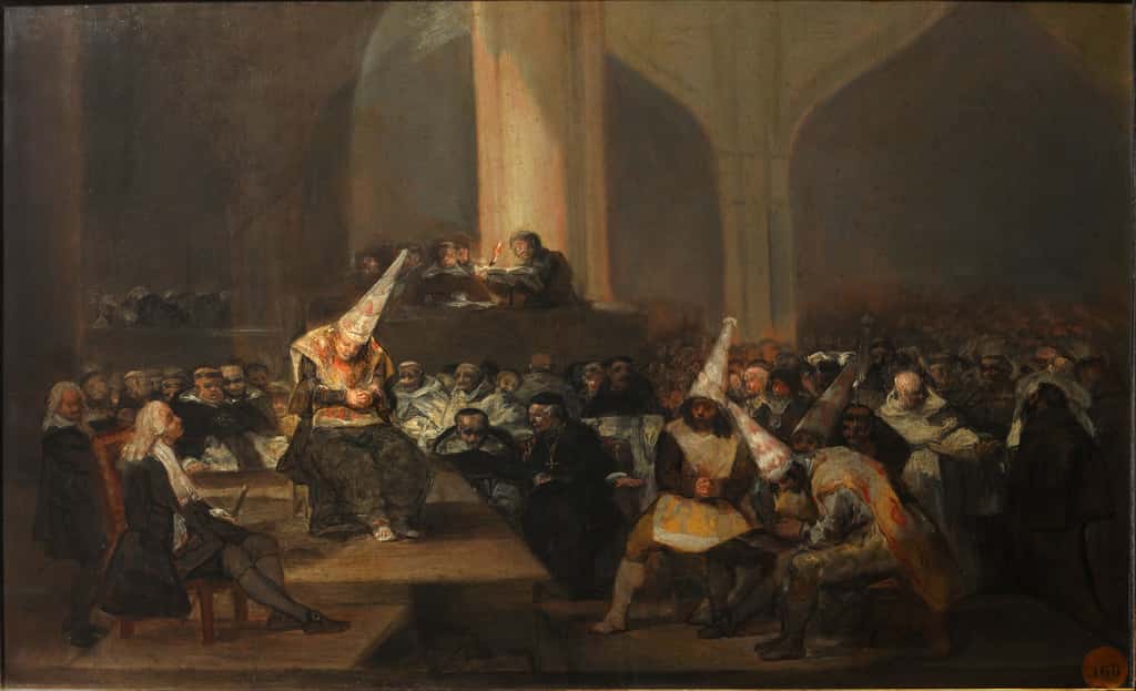 <em>Tribunal de l'Inquisition</em> par Francisco de Goya, entre 1812 et 1819 (autodafé dans une église : les accusés portent un chapeau pointu ; les flammes peintes sur les chapeaux supposent qu'ils sont condamnés au bûcher). © Académie royale des Beaux-Arts de San Fernando, Madrid, <em>Wikimedia Commons</em>, DP