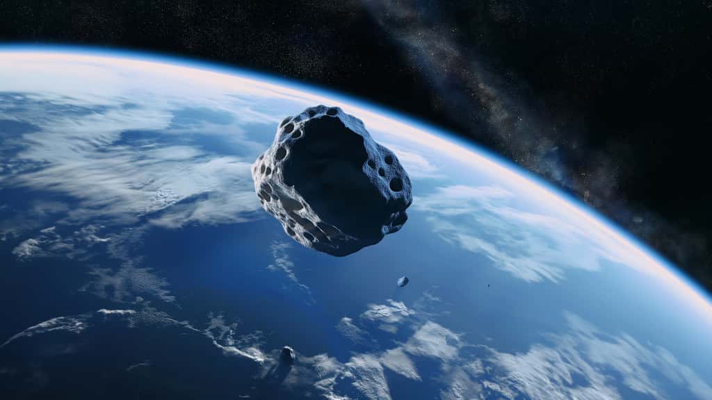 Illustration générée par IA d'un astéroïde en orbite autour de la Terre. © Www.Freund-Foto.De, Adobe Stock