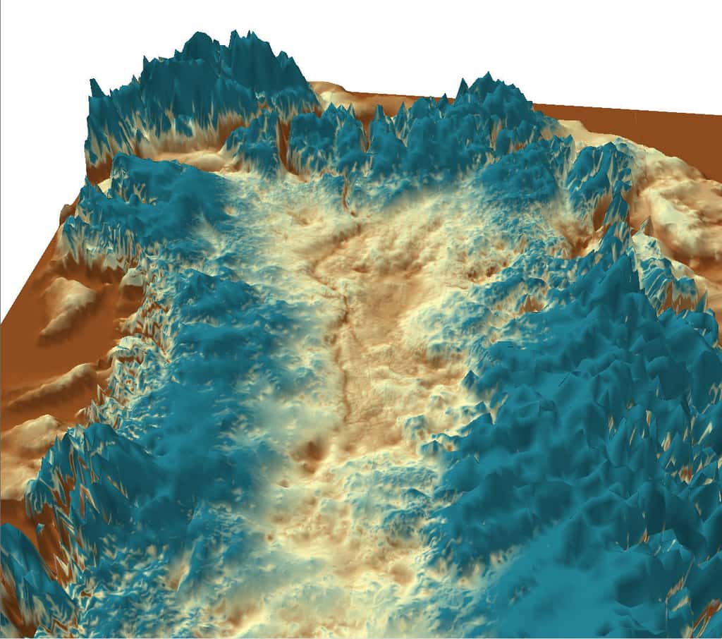 Vue tridimensionnelle du canyon découvert au Groenland, sous la calotte glaciaire. Il débute au centre de l’île, puis se dirige ensuite vers sa partie nord-ouest, où il rejoint l’océan Arctique. © J. Bamber, <em>University of Bristol</em>