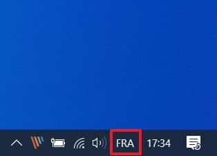 Effectuez un simple clic sur « FRA » à droite dans votre barre des tâches. © Microsoft