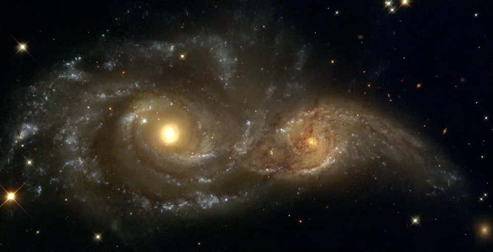 <em>« La modélisation a montré que les jeunes galaxies ont eu moins de temps pour fusionner avec d'autres »</em>, a déclaré le Dr Gupta. Ici, des galaxies spirales en collision. © Debra Meloy Elmegreen (<em>Vassar College</em>) et al. et l'équipe Hubble Heritage (AURA, STScI, Nasa)