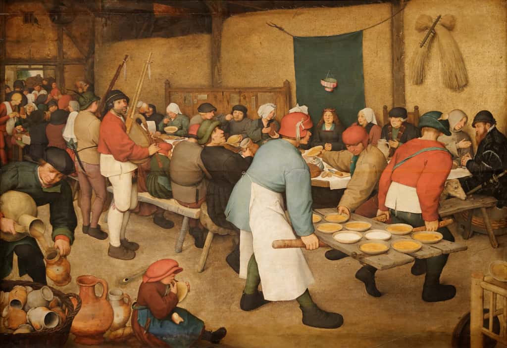 « <em>Le repas de noces</em> » par Pieter Brueghel l'Ancien en 1568. Musée d'Histoire de l'Art, Vienne, Autriche. © Wikimedia Commons, domaine public
