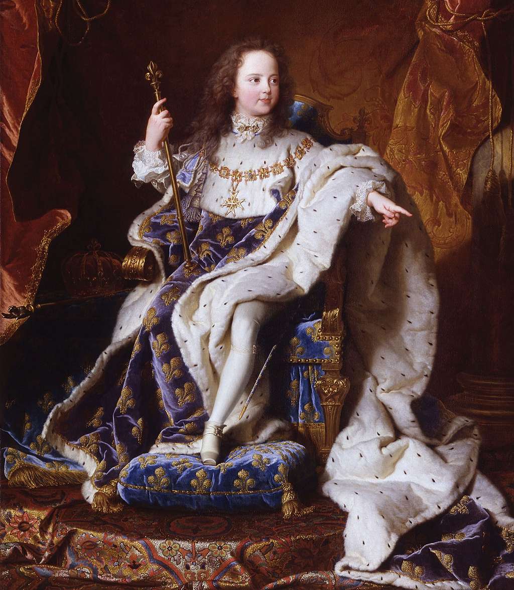 Portrait (commandé par le régent) du roi Louis XV enfant en grand costume royal, par Hyacinthe Rigaud, en 1715. Louis XV sera sacré en 1722. Château de Versailles. © RMN (Château de Versailles), Gérard Blot
