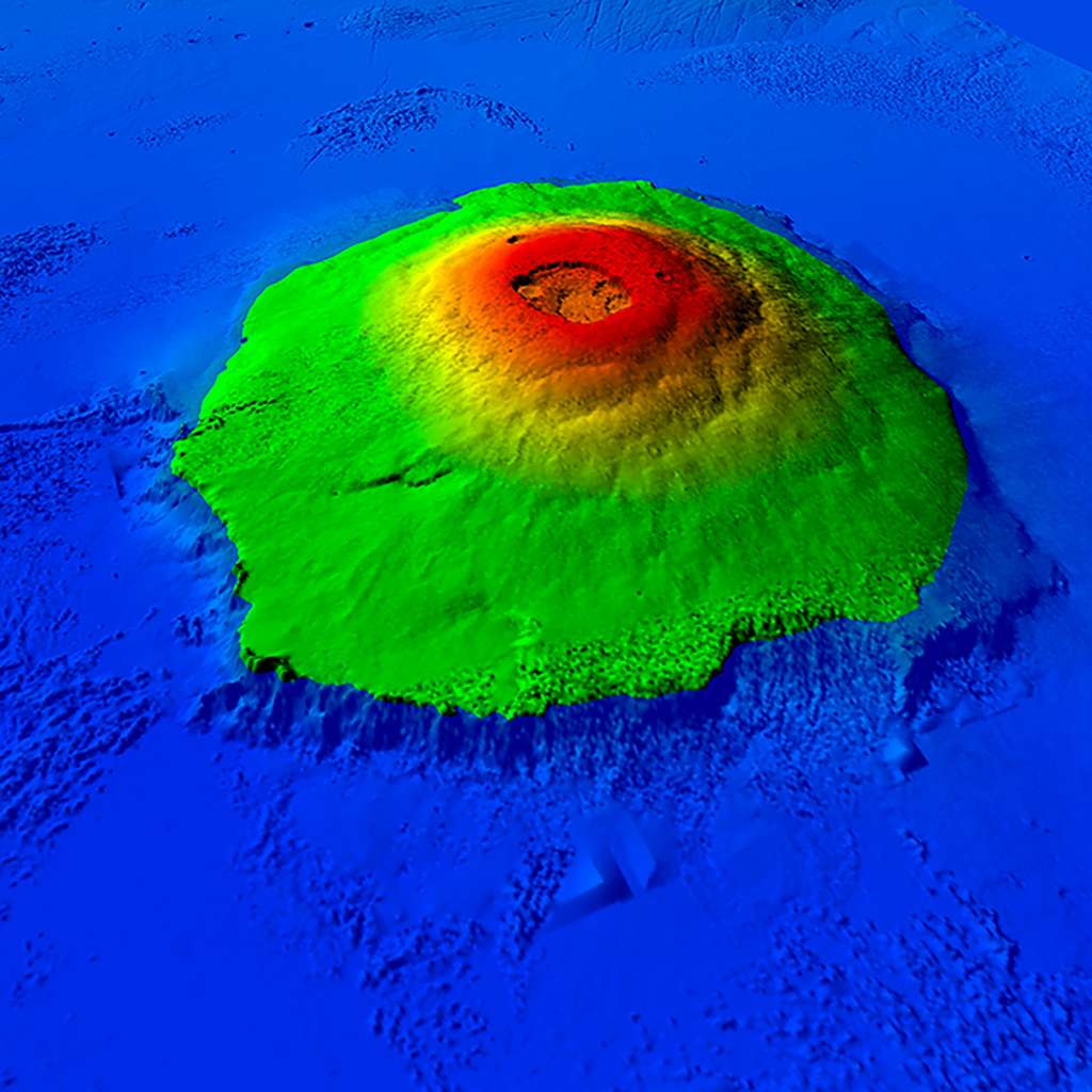 Imaginez une île volcanique, à peu près de la taille de la France, mais avec une hauteur dépassant les 20 000 mètres. Voilà ce à quoi pouvait ressembler l'île <em>Olympus Mons</em> ! Cette image a été élaborée à partir des données publiques Mola. © A.Hildenbrand, Geops, CNRS 