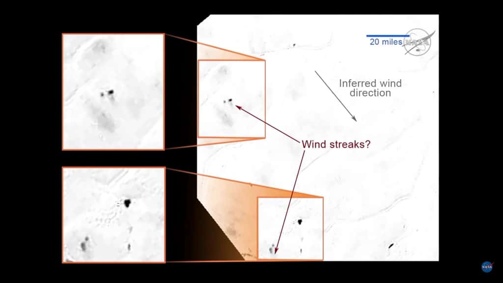 Sur la blanche plaine Spoutnik, des formes noires sont flanquées de zones grises, toutes orientées dans le sens (<em>Wind streaks?</em>). Ce pourrait être des poussières emportées par le vent, ce qui permet d'en déduire la direction (<em>Inferred wind direction</em>). © Nasa/JHUAPL/SWRI