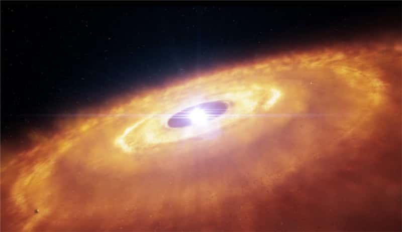La très jeune étoile AU Microscopii, située à 32 années-lumière, est entourée d'un disque de poussière qui pourrait nous en apprendre davantage sur la formation des planètes. © Eso