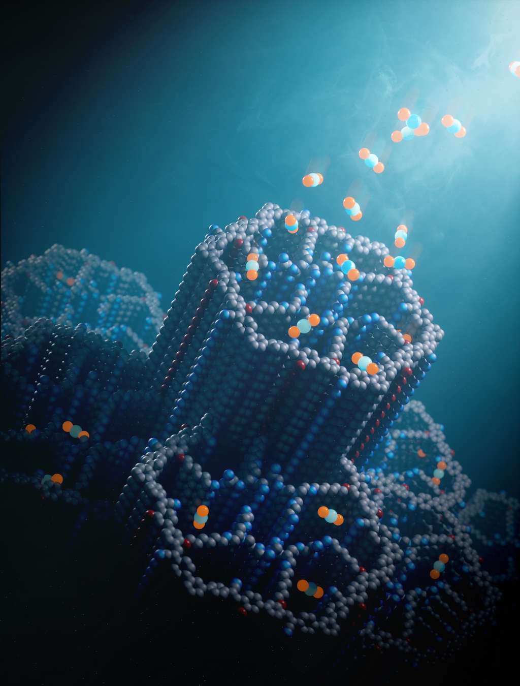 Le matériau poreux développé par les chercheurs de l’université de Californie (États-Unis) est de ceux que l’on appelle les structures organiques covalentes (COF). Il possède des canaux hexagonaux décorés de polyamines qui lient efficacement les molécules de dioxyde de carbone (CO<sub>2</sub>) – boules bleues et orange – à des concentrations trouvées dans l’air ambiant. © Chaoyang Zhao, Université de Californie à Berkeley