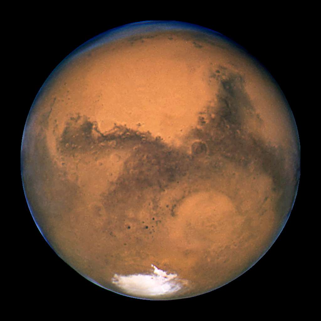 La planète Mars a probablement, un jour, porté de l'eau liquide. Ce fut notamment le cas dans le cratère Gale qui devait contenir un lac. © Nasa, Esa, <em>The Hubble Heritage Team</em> (STScI/AURA), Wikimedia Commons, DP