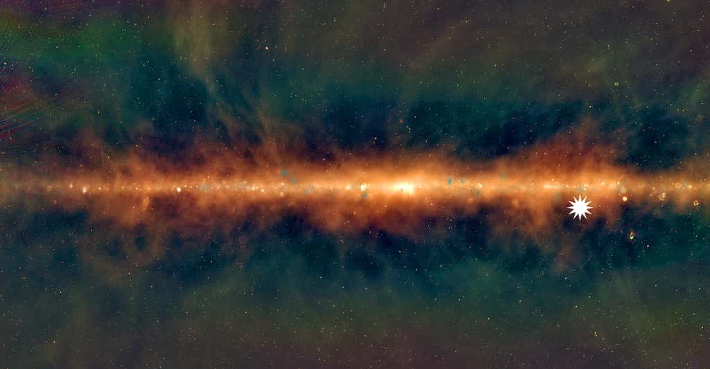 Des chercheurs du Centre international de recherche en radioastronomie (Icrar, Australie) ont identifié une source radio transitoire étonnante — symbolisé sur cette image par une fausse étoile. Ici, la Voie lactée vue par le <em>Murchison Widefield Array</em> (MWA, Australie) : les fréquences les plus basses sont en rouge, les moyennes sont en vert et les plus élevées en bleu. © Natasha Hurley Walker, ICRAR, Université Curtin