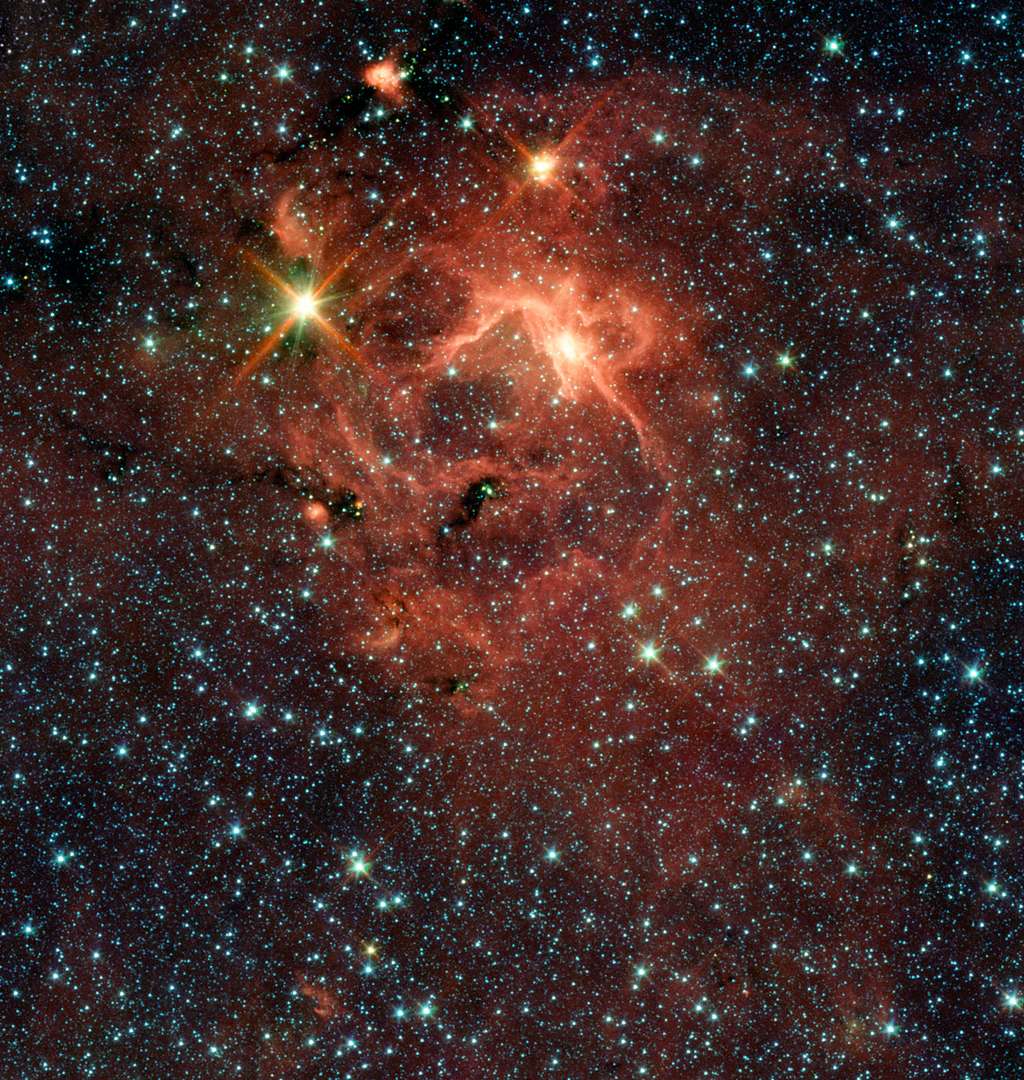 Une image de l'objet IRAS 13481-6124 vue par Spitzer. Crédit : ESO/Spitzer/NASA/JPL/S. Kraus