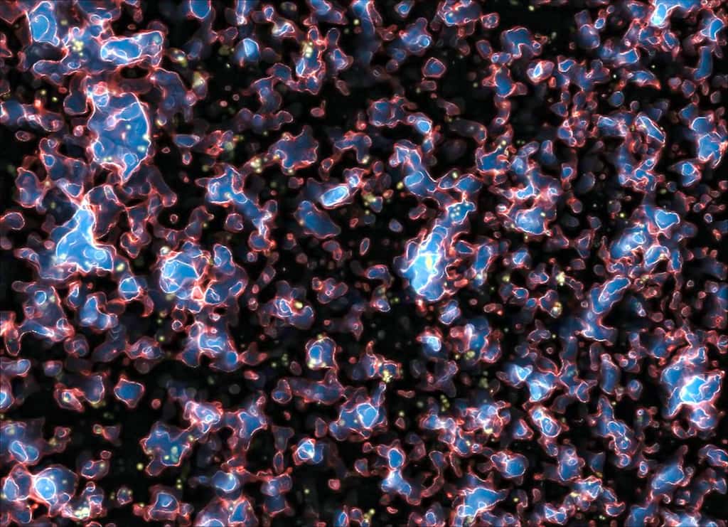 Une image extraite de la simulation montrant la réionisation de l'univers observable sous l'influence du rayonnement ultraviolet des galaxies, quelques centaines de millions d'années après la recombinaison et l'émission du rayonnement fossile. Les zones ionisées par le rayonnement UV, et qui sont devenues translucides, sont en bleu. Les régions opaques aux UV, contenant encore de l'hydrogène et de l'hélium neutres, sont en noir. Le front d'ionisation est quant à lui représenté en rouge et blanc. Une vidéo complète de cette simulation se trouve sur le site de son auteur, <a href="http://www.cita.utoronto.ca/~malvarez/index.shtml" target="_blank">Marcelo Alvarez</a>. © M. Alvarez, R. Kaehler et T. Abel