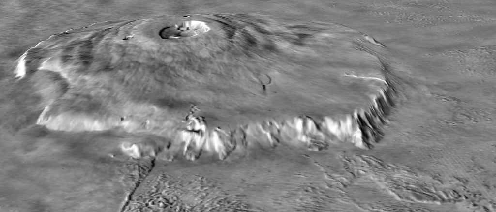 En combinant les données de l'altimètre laser de la sonde Mars Global Surveyor (MOLA) et les images obtenues par les sondes Viking, les scientifiques ont reconstitué cette vue d'Olympus Mons. Pour mieux montrer le relief de l'édifice, ils ont multiplié par dix l'échelle verticale. © Nasa 
