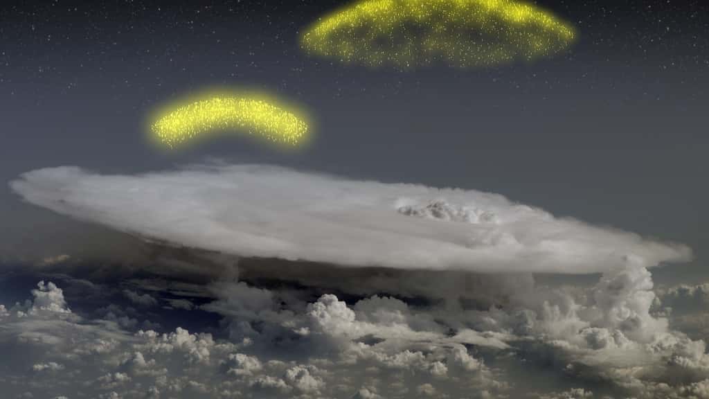 Des flashs d'électrons et de positrons, montant vers le haut de l'atmosphère, ici représentés en jaune sont produits par des processus d'accélération dans certains nuages. © Nasa/<em>Goddard Space Flight Center</em>.