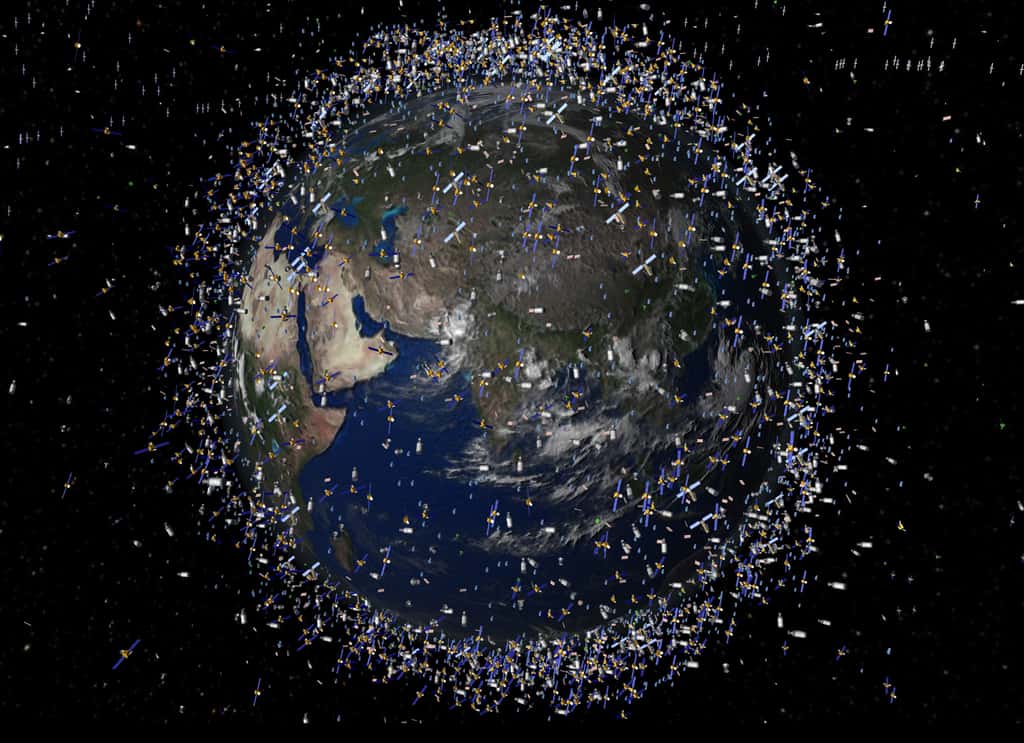 Vision d'artiste des débris spatiaux présents autour de la Terre, aux alentours de 2.000 km d'altitude. © Esa 2009