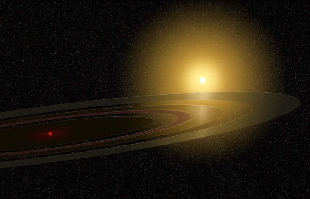 Une vue d'artiste des anneaux entourant peut-être une naine rouge autour de l'étoile 1SWASP J140747.93-394542.6. © Mike Osadciw