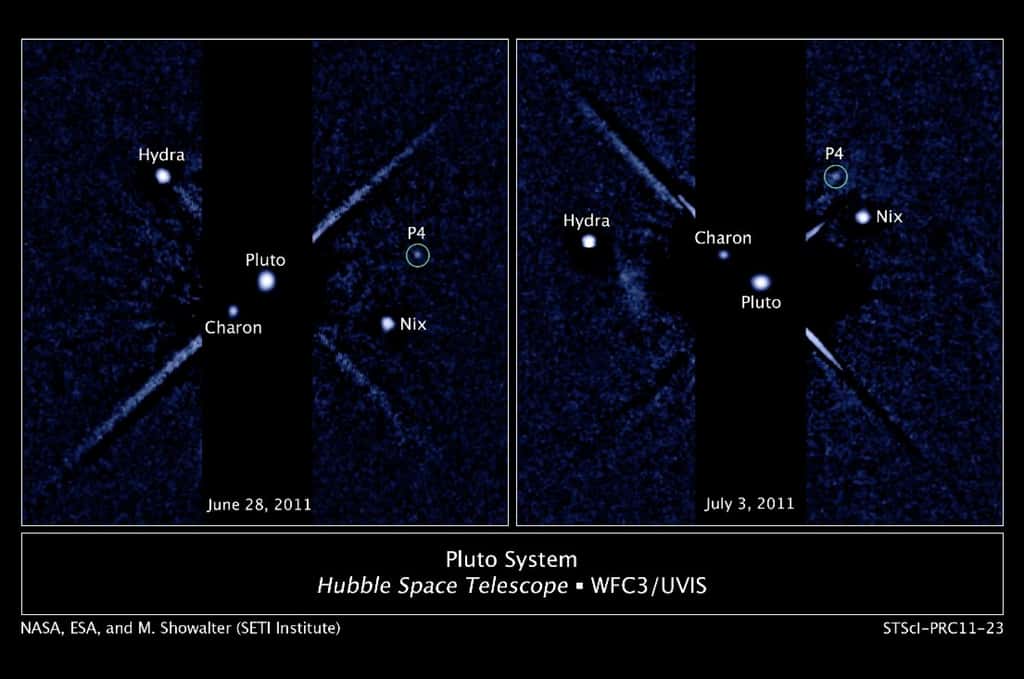 Pluton et les quatre satellites qu'on lui connaît, vus (un bien grand mot) par Hubble en 2011. © Nasa/Esa/M. Showalter (<em>Seti Institute</em>)