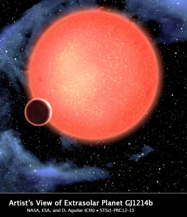 Une vue d'artiste de GJ 1214 b orbitant très près de sa naine rouge. © Nasa, Esa et D. Aguilar (Harvard-<em>Smithsonian Center for Astrophysics</em>)