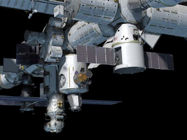 Ce dessin montre la capsule Dragon (au premier plan), qui apportera à l'équipage de l'ISS 460 kilogrammes de fret, surtout des consommables non essentiels. © SpaceX