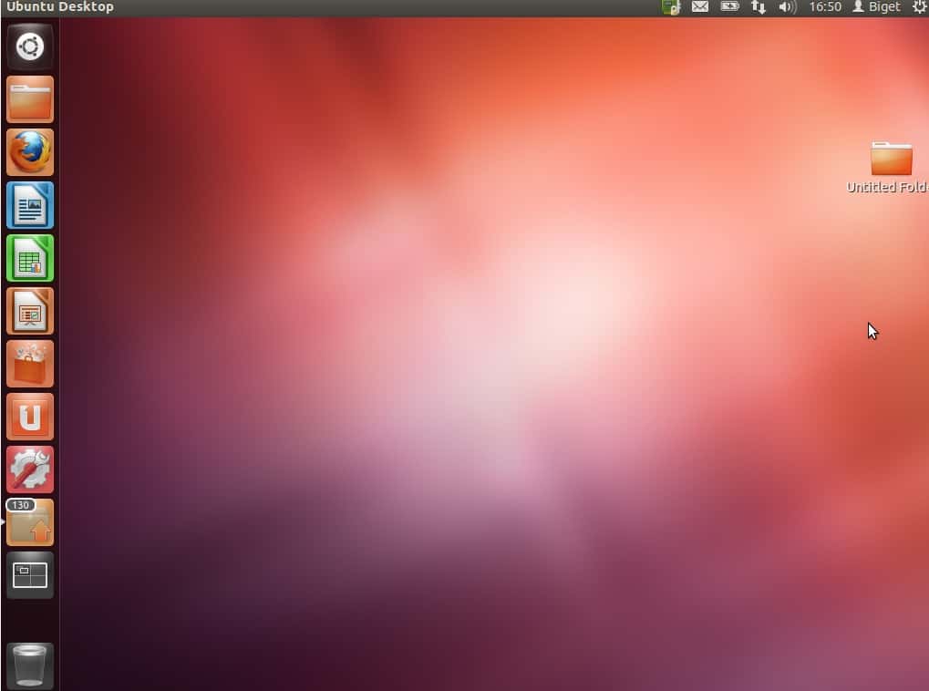 Le bureau d'Ubuntu 12.04 est basique. Une barre de lancement rapide et un bouton rond permettant d'afficher tous les programmes installés. En haut à droite se trouve la zone de notifications. © FS/EP/S. Biget