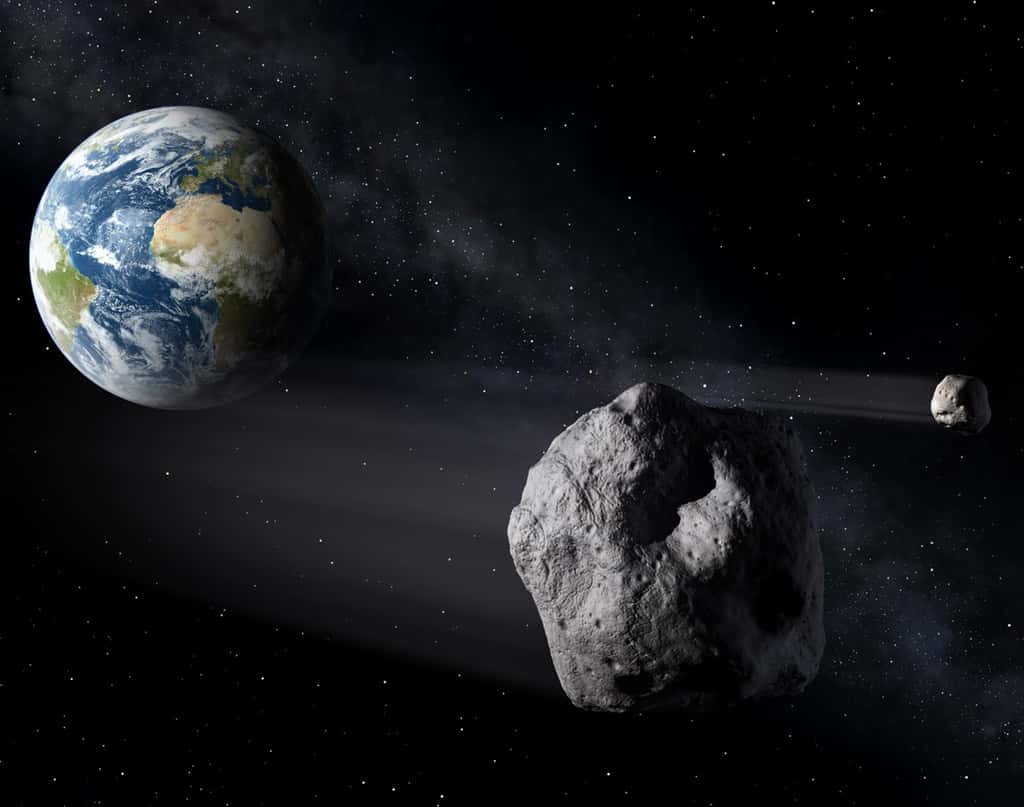 Cette vue d'artiste montre des astéroïdes s'approchant de la Terre. Les experts de l'Esa souhaitent coordonner leurs efforts en matière de détection et éventuellement de déviation de ces objets dangereux. © P.Carril, Esa