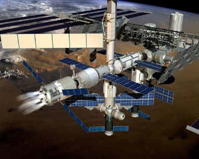 Pendant la durée de l'arrimage, <br />les moteurs de l'ATV seront régulièrement allumés pour maintenir la station en orbite. <br />(Crédit : ESA)