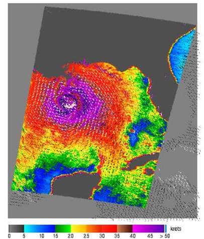 Vitesses et directions des vents de Katrina le 29 août 2005 (alors ouragan de catégorie 4), mesurées par le satellite QuikSCAT <br />Les rafales les plus violentes figurent en violet, et entourent le centre de l'ouragan<br /> (Crédits : NASA JPL)
