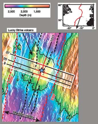 <br />Figure 1 - Segment de la dorsale médio-Atlantique au site Lucky Strike. Le contour fin noir est à 2000 mètres de profondeur, il délimite le volcan au centre de la vallée axiale et l'étoile bleue indique le champ hydrothermal. Les pointillés rouges indiquent les failles qui bordent la vallée axiale et les pointillés noirs celles qui délimitent le fossé central (rift). Le rectangle blanc indique la zone d'étude, les traits noirs les profils de sismique réflexion et les traits rouges l'emplacement de la chambre magmatique.<br />&copy; IPGP-CNRS 