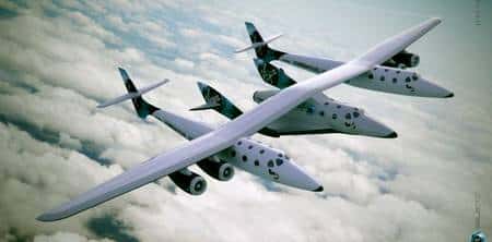 Ensemble avion porteur WhiteKnightTwo et SpaceShipTwo en vol (vue d’artiste). Crédit Virgin Galactic