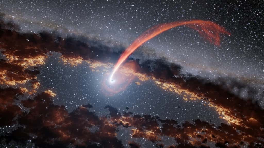 Sur cette illustration, le flux de lumière provenant d’une étoile déchirée en lambeaux au moment de se faire dévorer par un trou noir. Ce dernier s’entoure d’un anneau de poussière, un peu comme l’assiette du petit dernier à la fin de son repas. © Nasa, JPL-Caltech