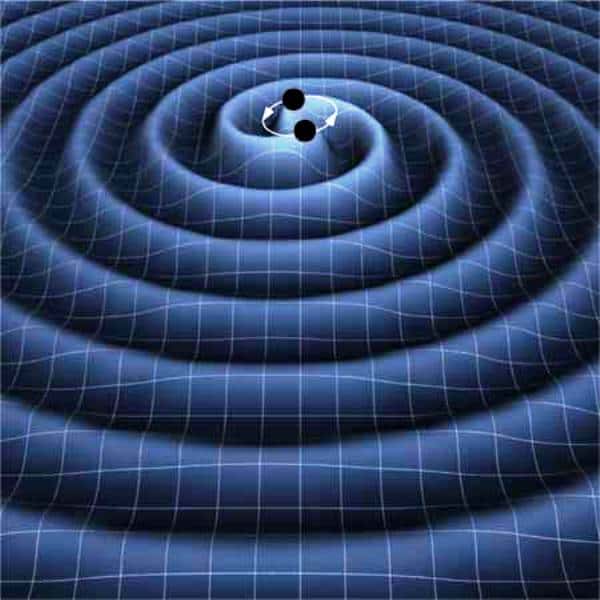 Une représentation d'artiste des ondes gravitationnelles se propageant dans le tissu de l'espace-temps et rayonnées par un couple de trous noirs spiralant l'un vers l'autre en perdant de l'énergie suite à l'émission de ces ondes. © K. Thorne (Caltech)-T. Carnahan (Nasa GSFC)