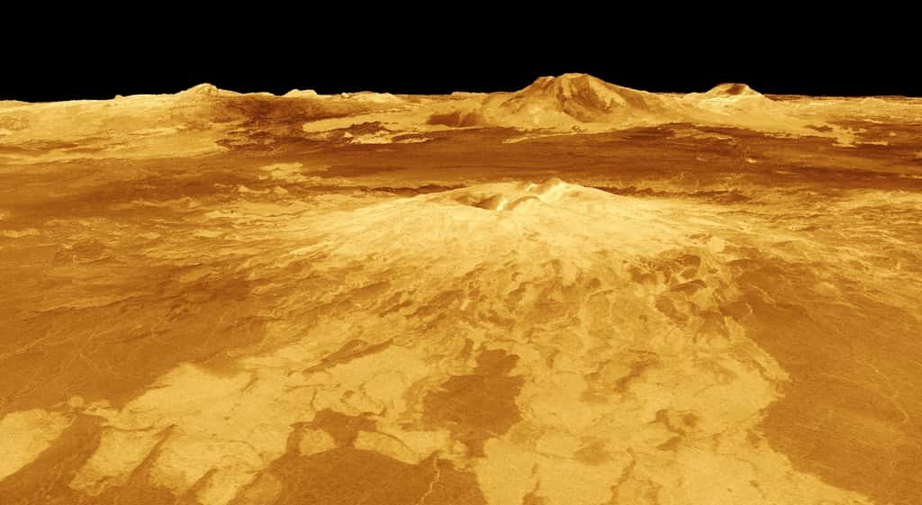 Sur cette image, la topographie de Vénus dérivée des données de Magellan montre Idunn Mons. Son altitude de 2,5 kilomètres a été exagérée par rapport à la plaine environnante qui s'étend sur 200 kilomètres environ. Les couleurs, reliées au flux de chaleur, indiquent un changement de composition au sommet du volcan. © Nasa, ESA