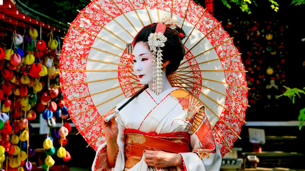 Une Geisha dans les rues de Kyoto