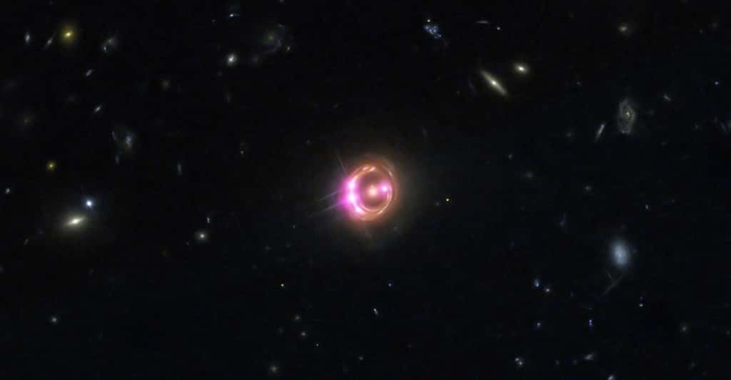 Un quasar situé à environ 6 milliards d'années lumière de la Terre. © Rayons X : Nasa/CXC/<em>Univ of Michigan</em>/R. C. Reis et al ; optique : Nasa/STScI