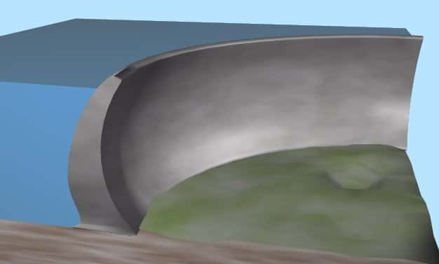 La forme courbe des barrages-voûtes permet de reporter les efforts dus à la poussée de l'eau sur chaque côté des rives. Il est particulièrement adapté aux vallées étroites. © Luk, Wikimedia Commons, cc by sa 3.0