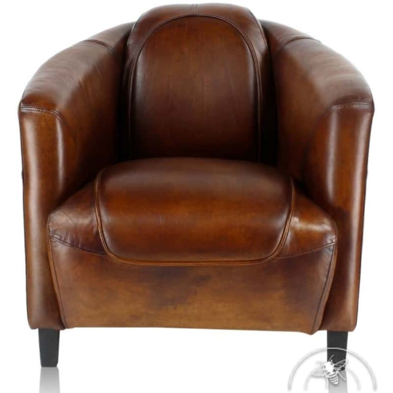 Le fauteuil club vintage, en cuir marron. Collection Orsay de la Maison Saulaie, reflet du style et de l'art de vivre à la française. © Maison Saulaie